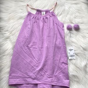 A tank top with fuzzy ear rings 👚👂🏽💍